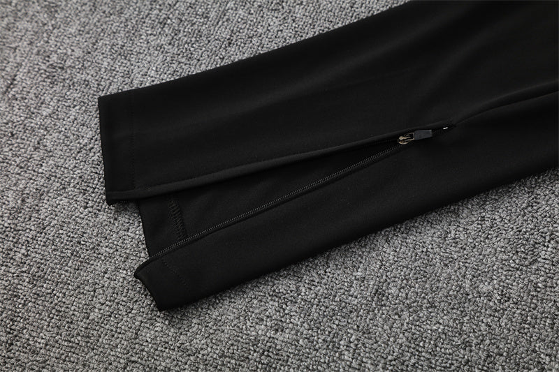 pants sleeve view of the Portugal 25/26 Quarter-Zip Tracksuit full black