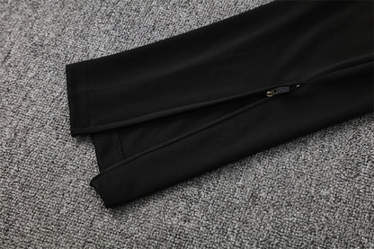 pants sleeve view of the Portugal 25/26 Quarter-Zip Tracksuit full black