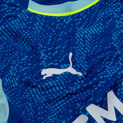 puma logo on the PUMA Marseille 2025/26 Third Shirt - Obsidian/PUMA Gold