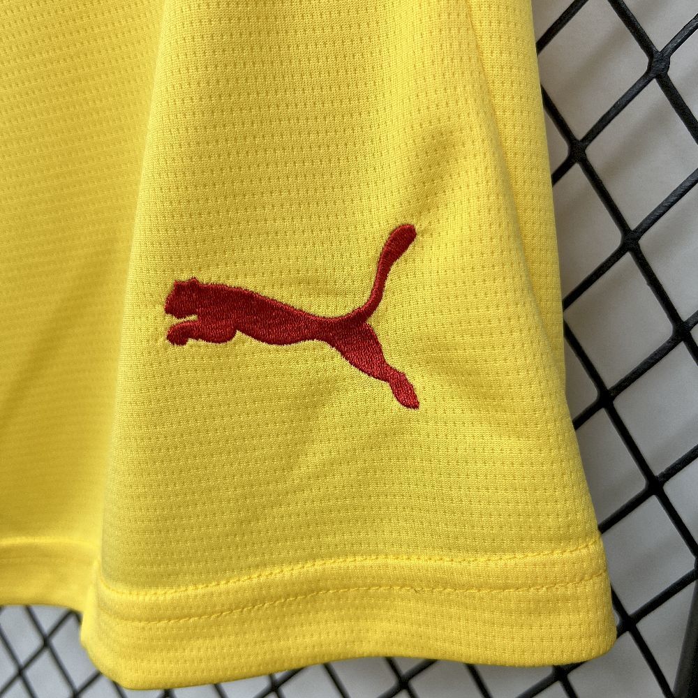puma logo view on the AC Milan 25/26 Third Yellow Shorts