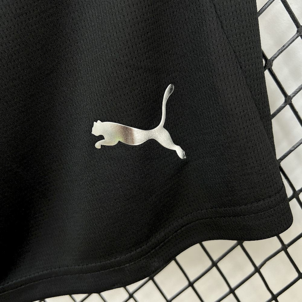 puma logo view on the Manchester City 25/26 Away Black Shorts