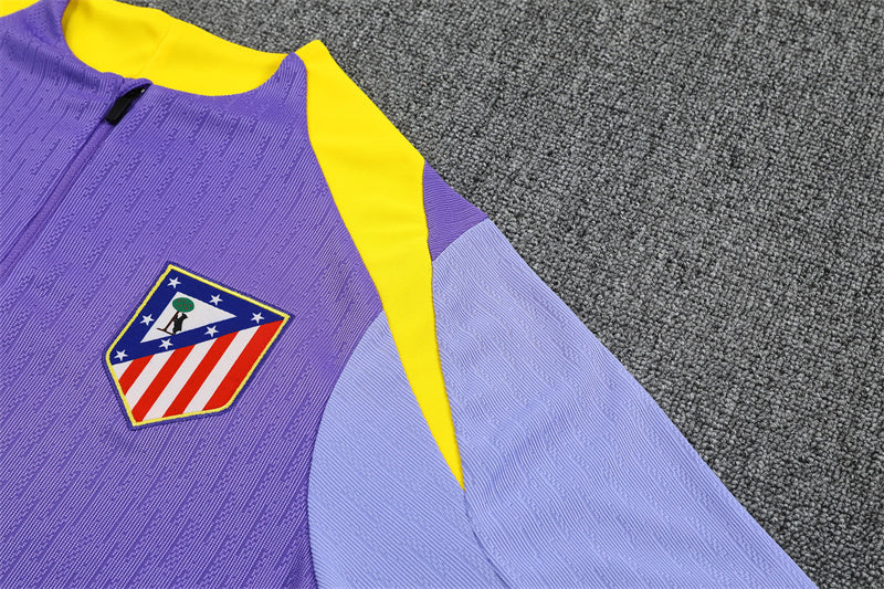 shoulder view of the Atletico Madrid 25/26 Quarter-Zip Tracksuit Purple/Pink/Navy colorway