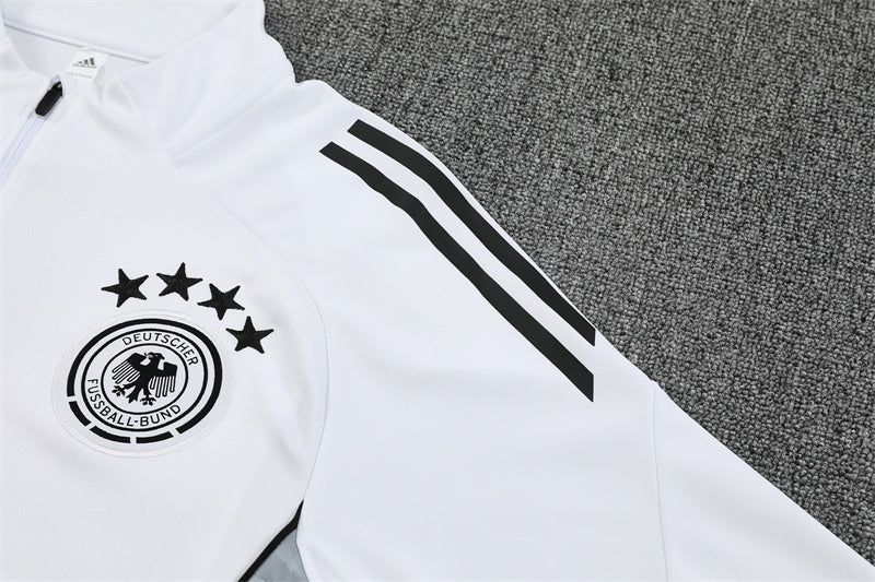 shoulder view of the white top of the Germany 25/26 Quarter-Zip Tracksuit
