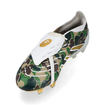 side view of the adidas Predator Elite Fold-over Tongue FG BAPE Pack in a White/Gold/Green colorway 