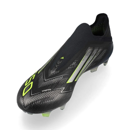 side view of the adidas F50 Elite FG Laceless Electric Stealth pack in Black/Lemon colorway