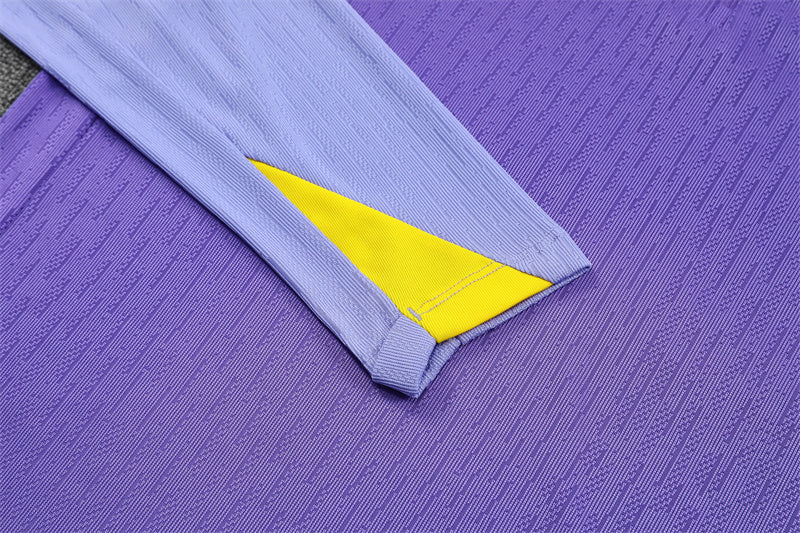 sleeve view on the Atletico Madrid 25/26 Quarter-Zip Tracksuit Purple/Pink/Navy colorway