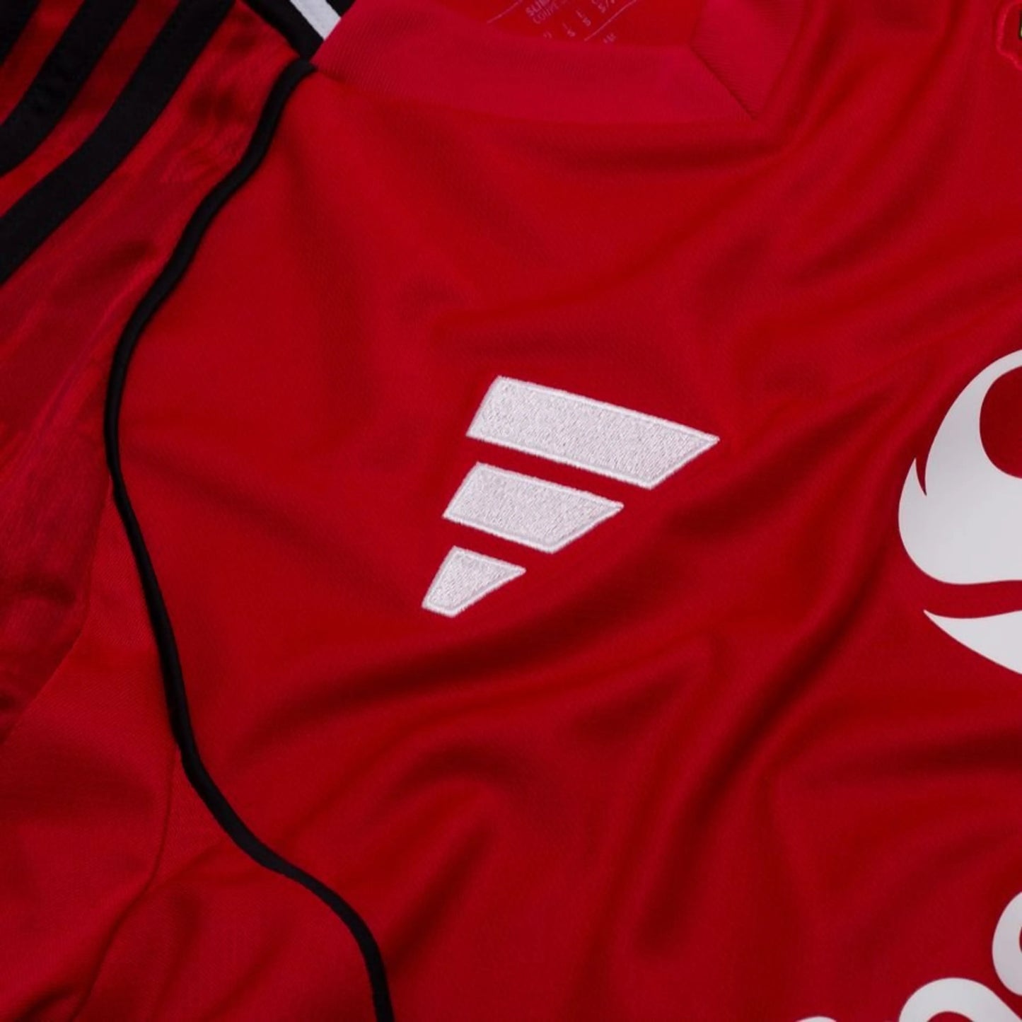 sponsor logo on the adidas Manchester United 2025/26 Home Shirt Long Sleeves