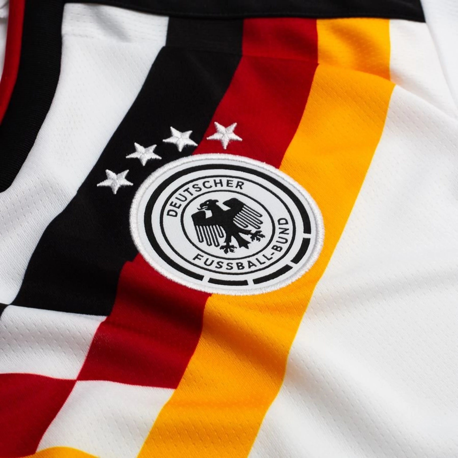 team logo of the adidas Germany Women's Home Shirt World Cup 2026 - White/Black/Red/Yellow