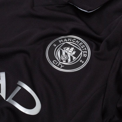 team logo on the PUMA Manchester City 2025/26 Away Shirt Long Sleeves