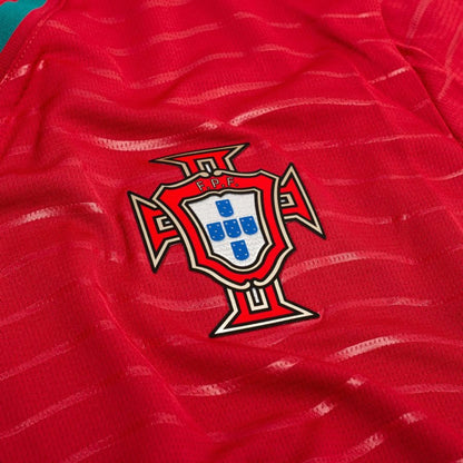 team logo on the PUMA Portugal 2026 World Cup Home Long Sleeve Jersey in Red and Green 