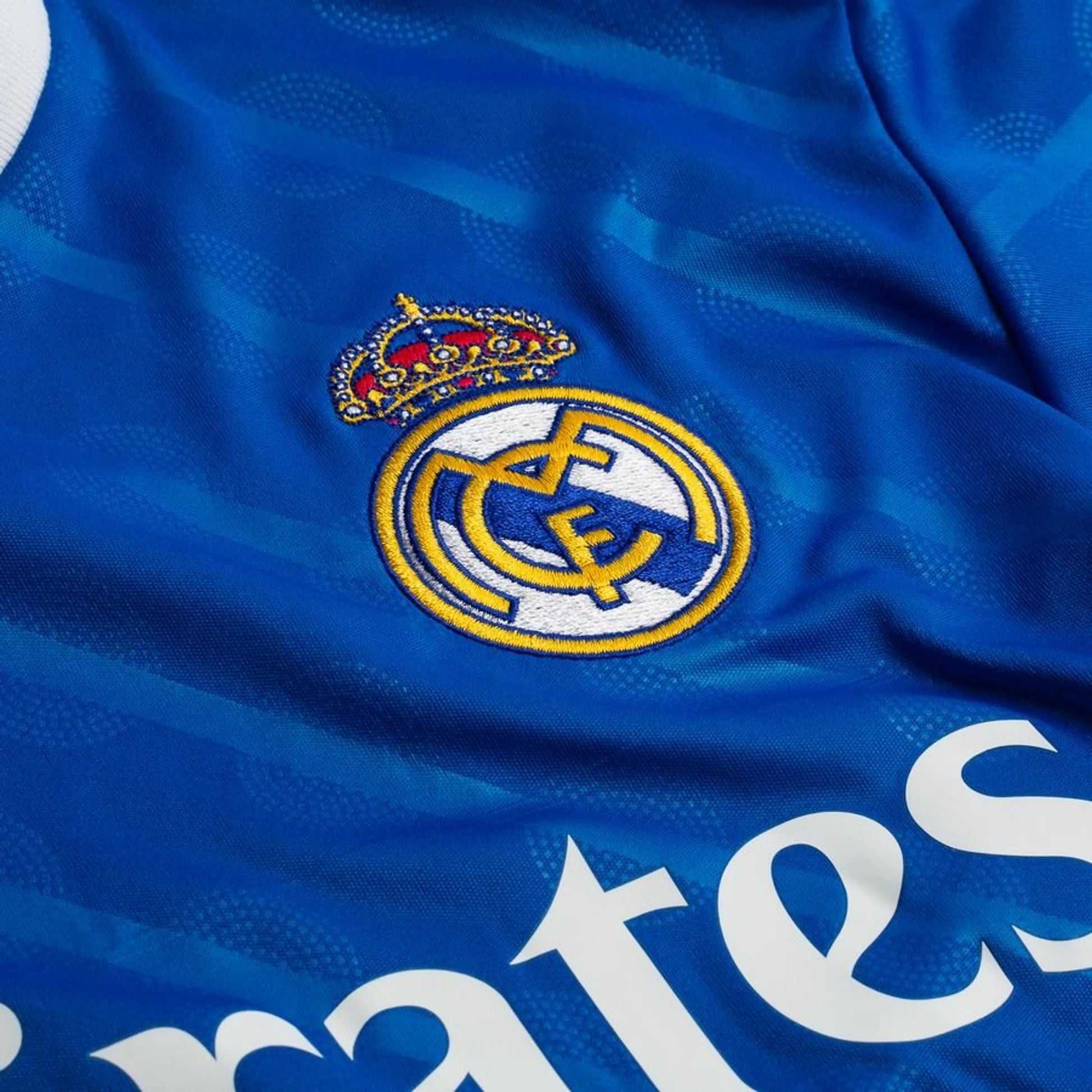 team logo view on the Adidas Real Madrid 2025/26 Third Blue Long Sleeve Jersey