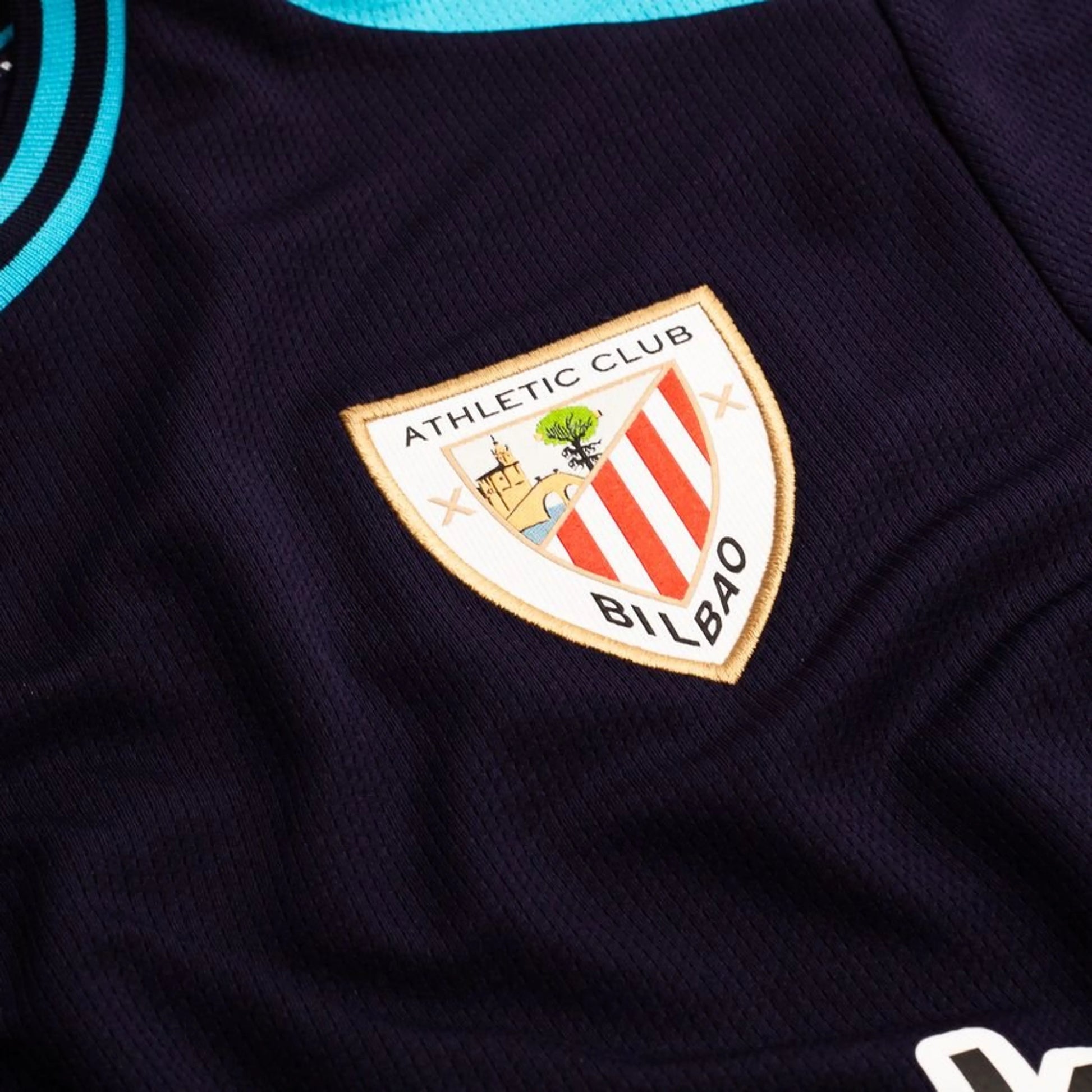 team logo view of the Castore Athletic Bilbao 2025/26 Away Navy Shirt