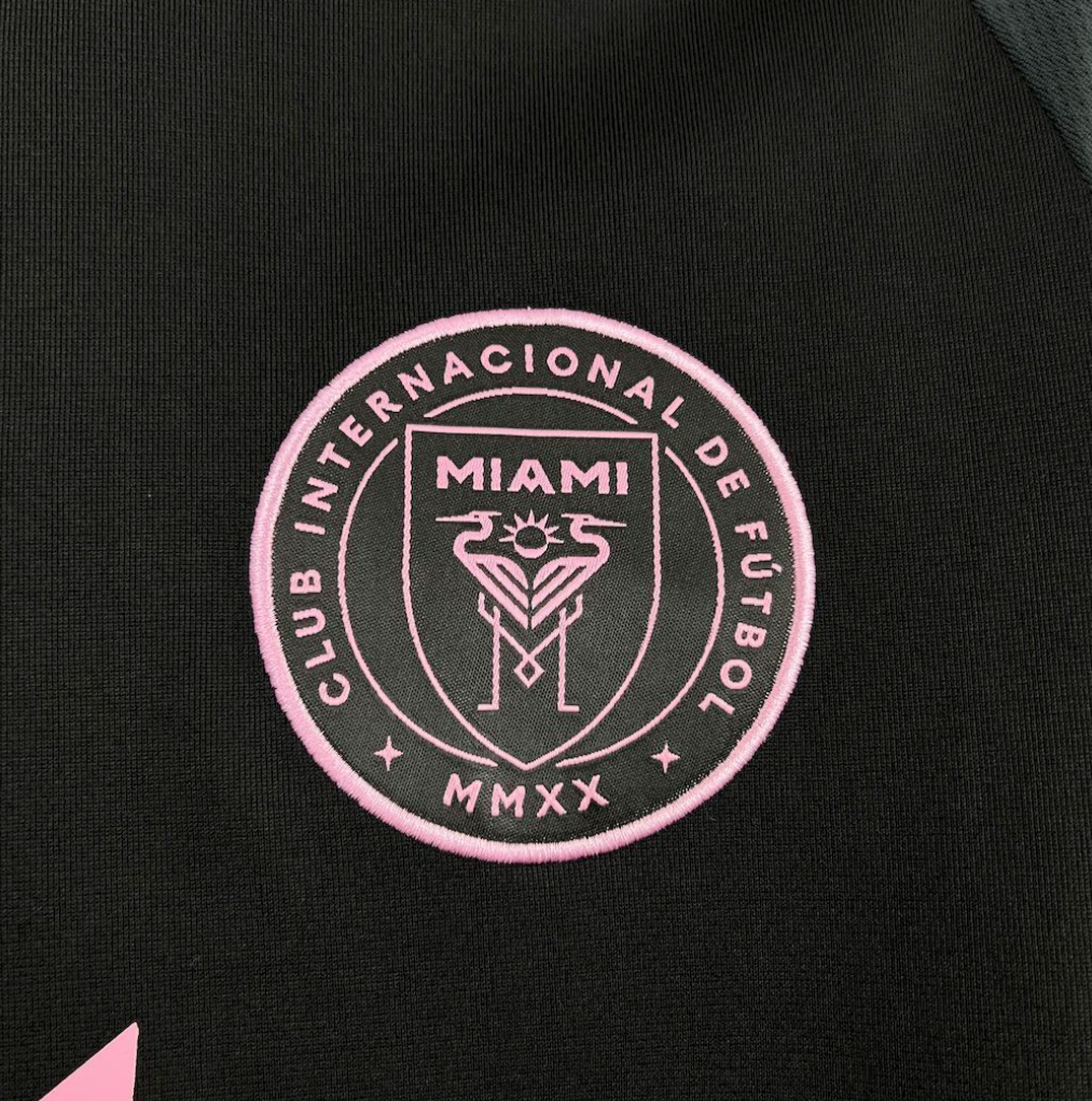 team logo view of the Inter Miami 25/26 Away Long Sleeve Black and pink Football Jersey Designed By Adidas