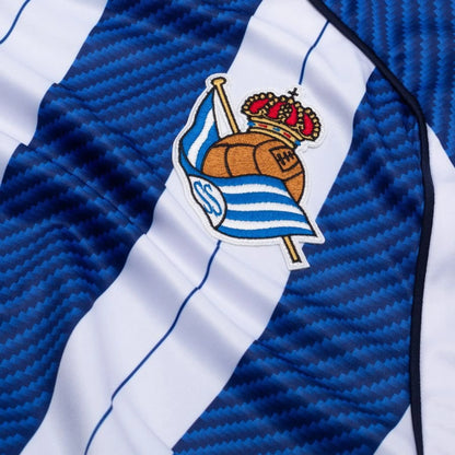 team logo view on the Macron Real Sociedad 2025/26 Home Blue and White Shirt