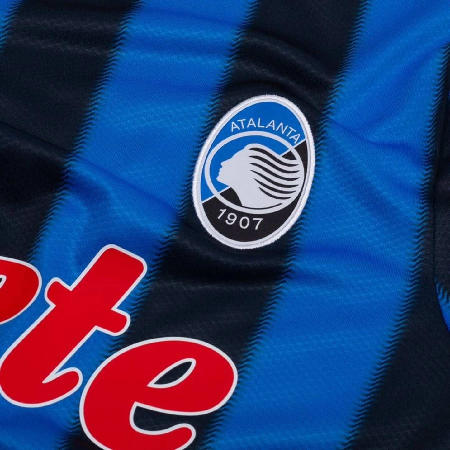 team logo view on the New Balance Atalanta BC 2025/26 Home Blue and Black Shirt