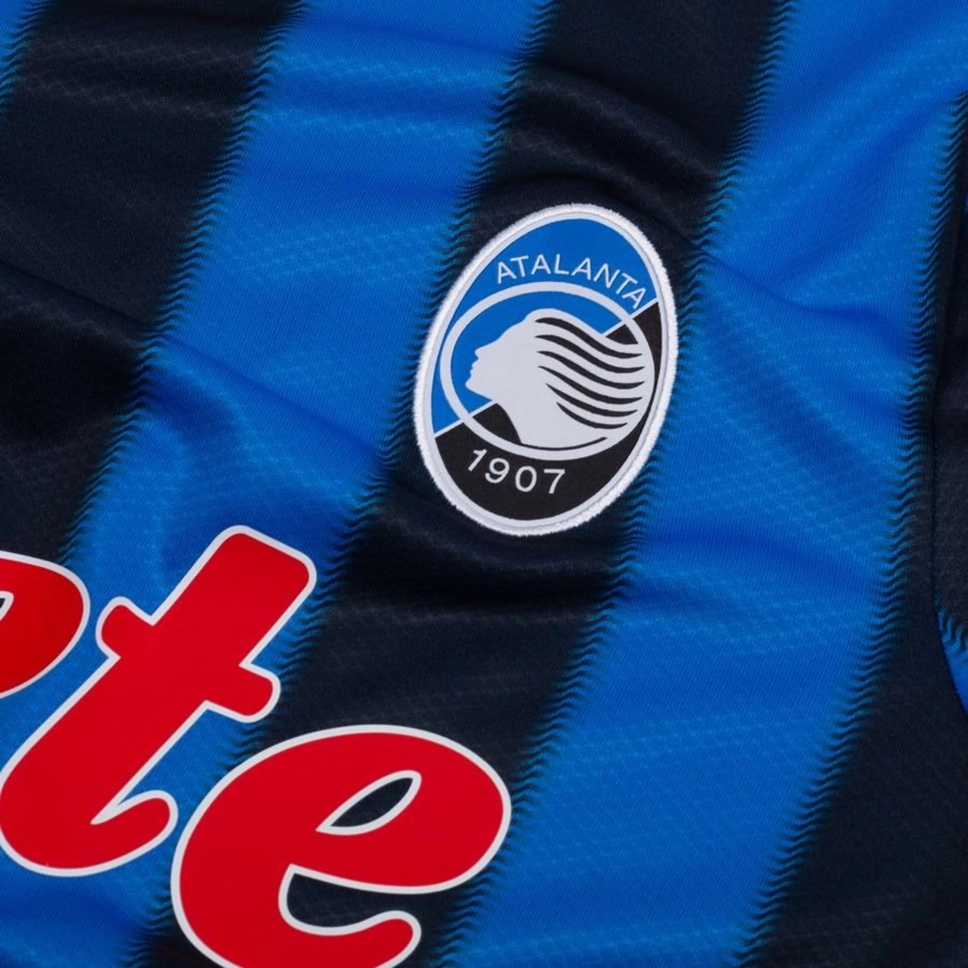 team logo view on the New Balance Atalanta BC 2025/26 Home Blue and Black Shirt