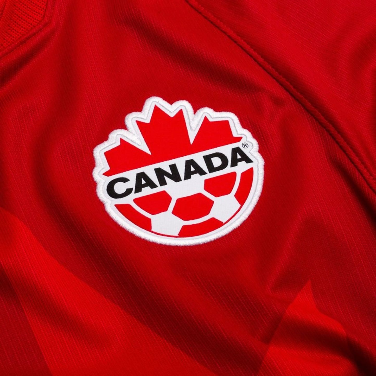 team logo view on the Nike Canada World Cup 2026 Home Red Shirt