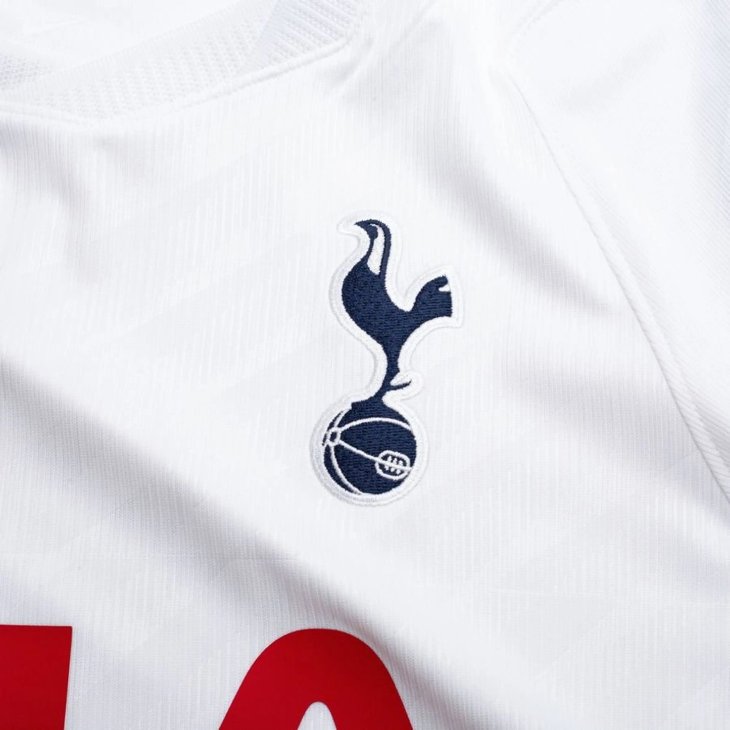 team logo view on the Nike Tottenham Hotspur Men's Home Shirt 2026/27 - White/Binary Blue