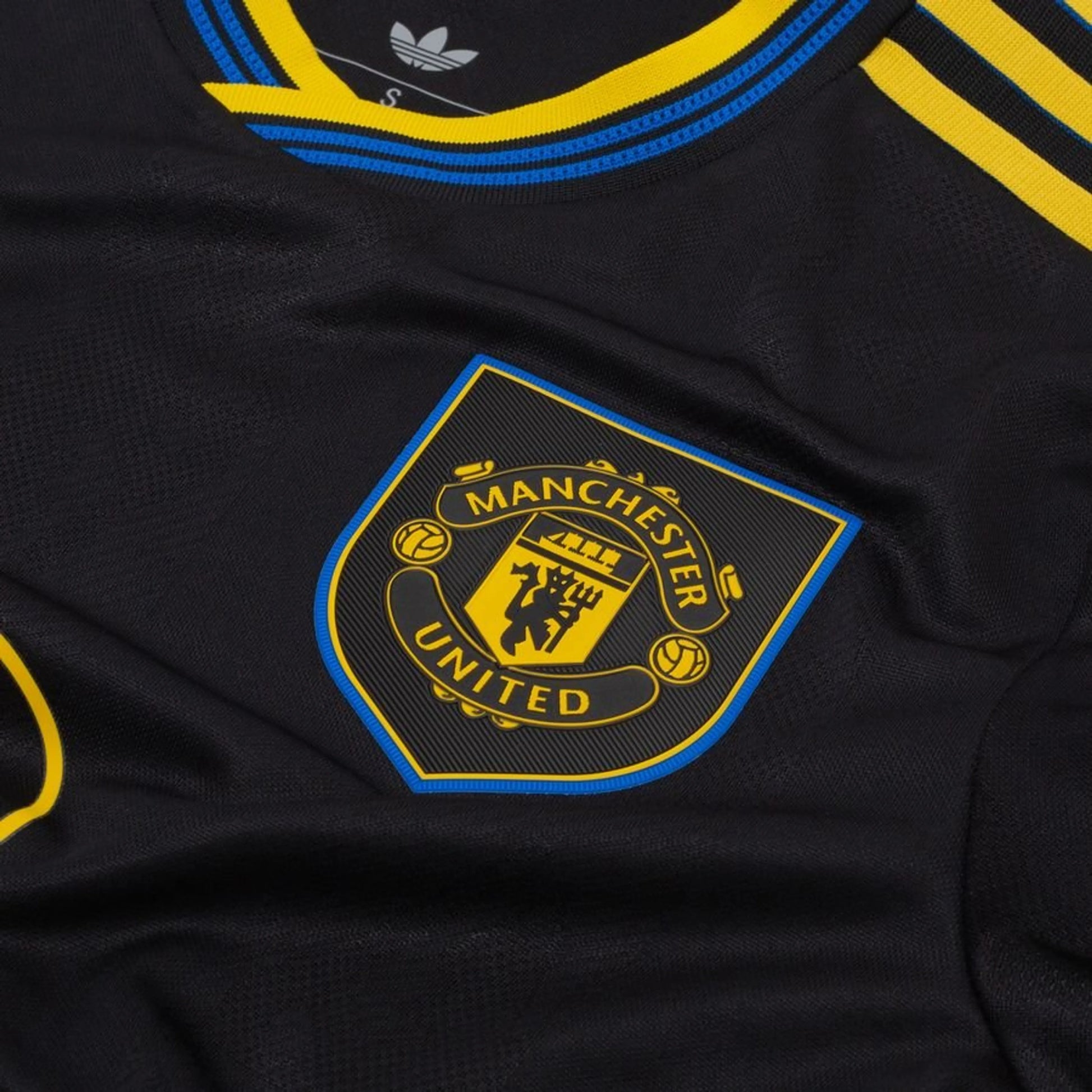 team logo view of the adidas Manchester United 2025/26 Third Black Jersey