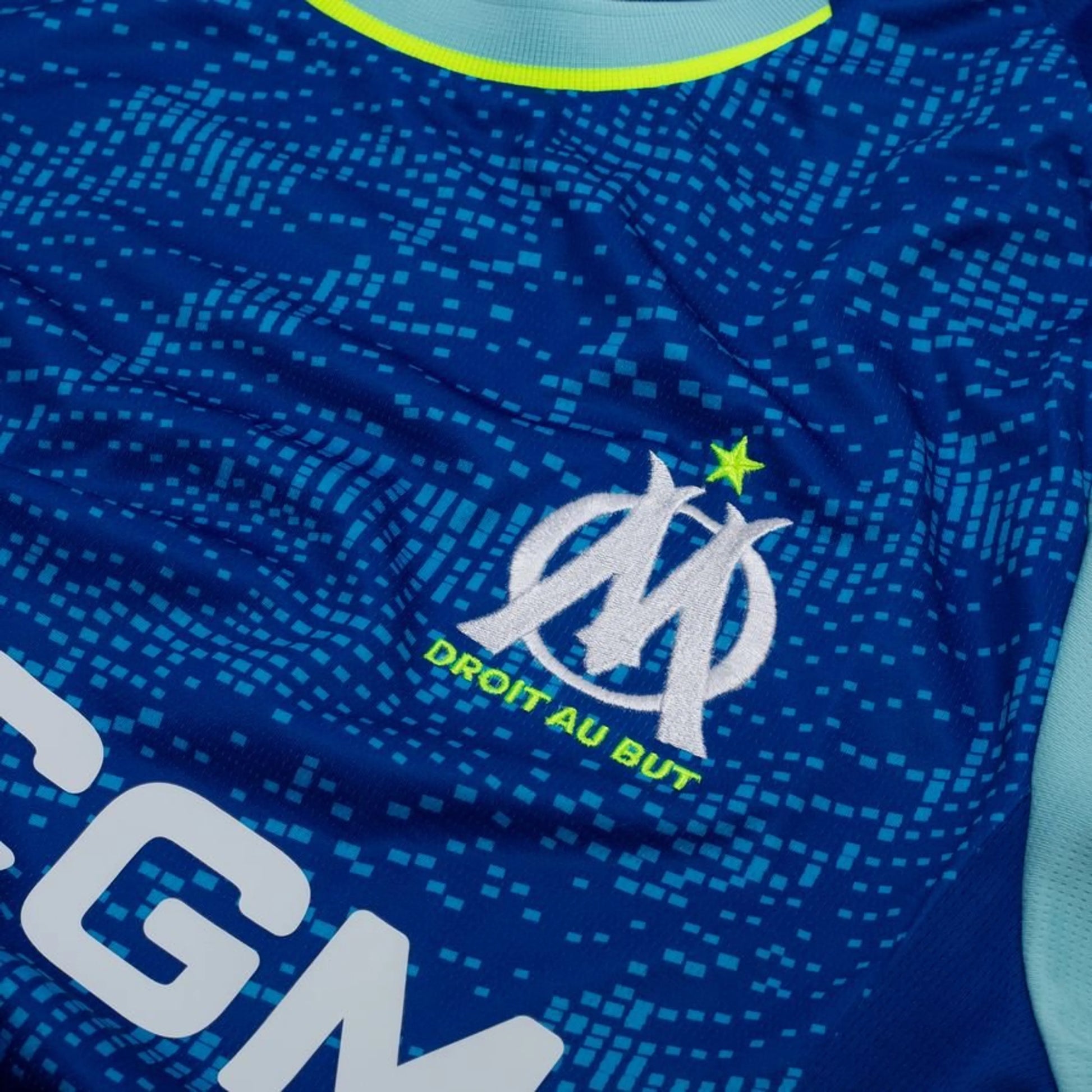 team logo view of the PUMA Marseille 2025/26 Third Shirt - Obsidian/PUMA Gold