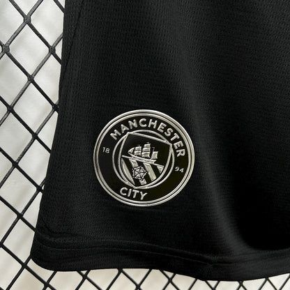 team logo view on the Manchester City 25/26 Away Black Shorts