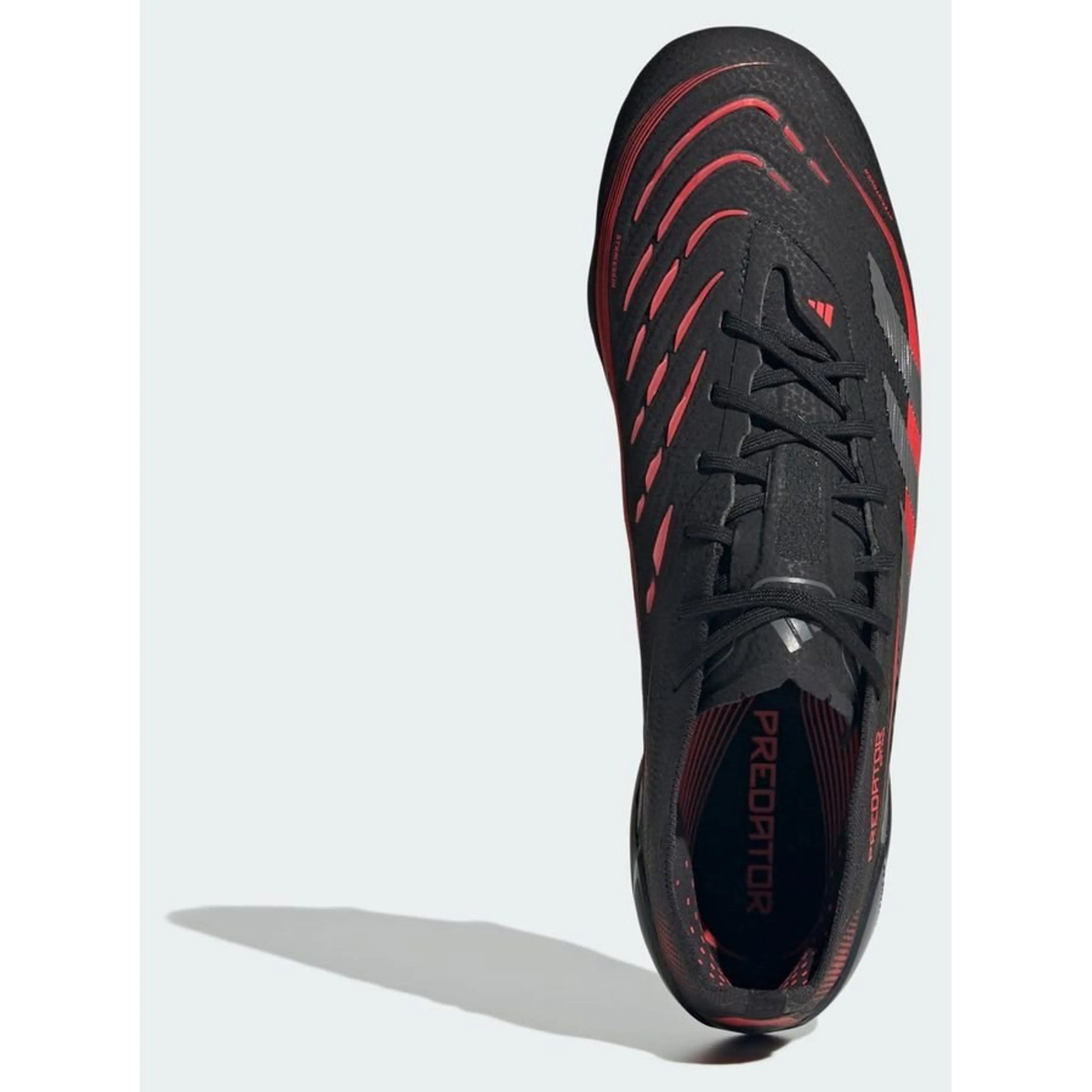 top view of the adidas Predator Elite FG "Stealth Victory" pack in a Black/Red/Grey colorway